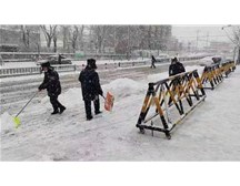 鏟雪除冰，暖心護(hù)行——通元保安在行動(dòng)